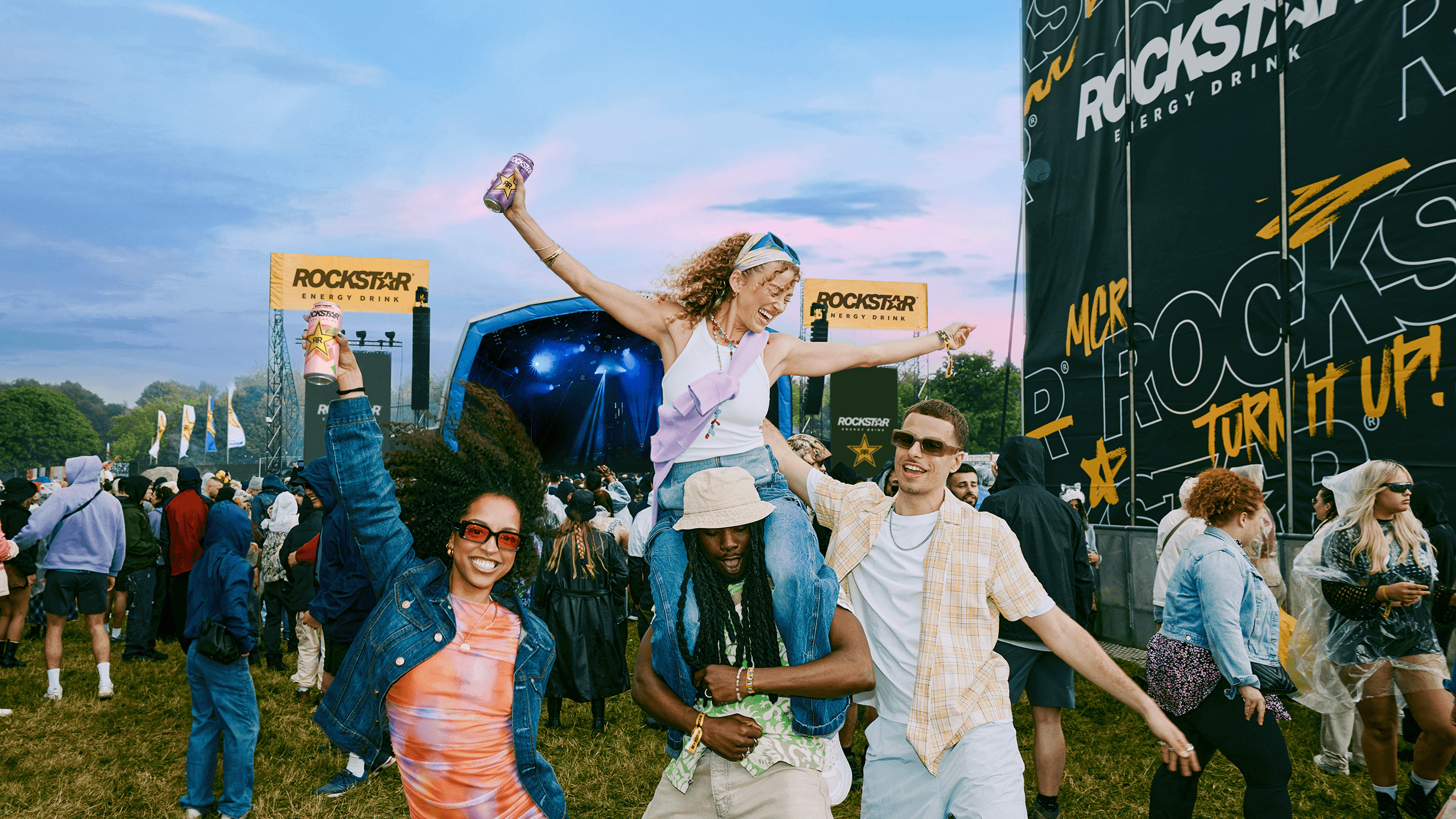 young people enjoying rockstar at a festival
